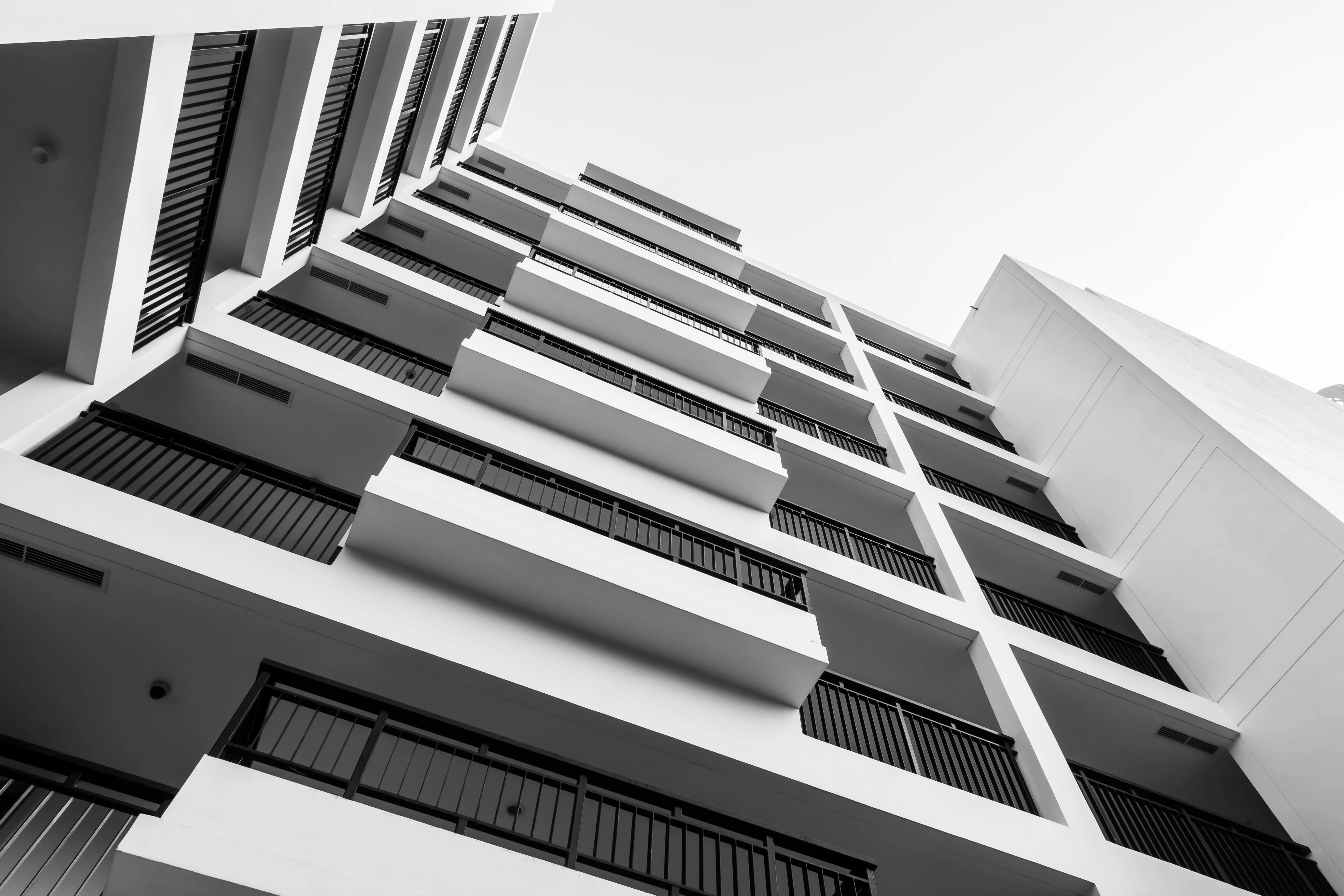 building in black and white tones looking up