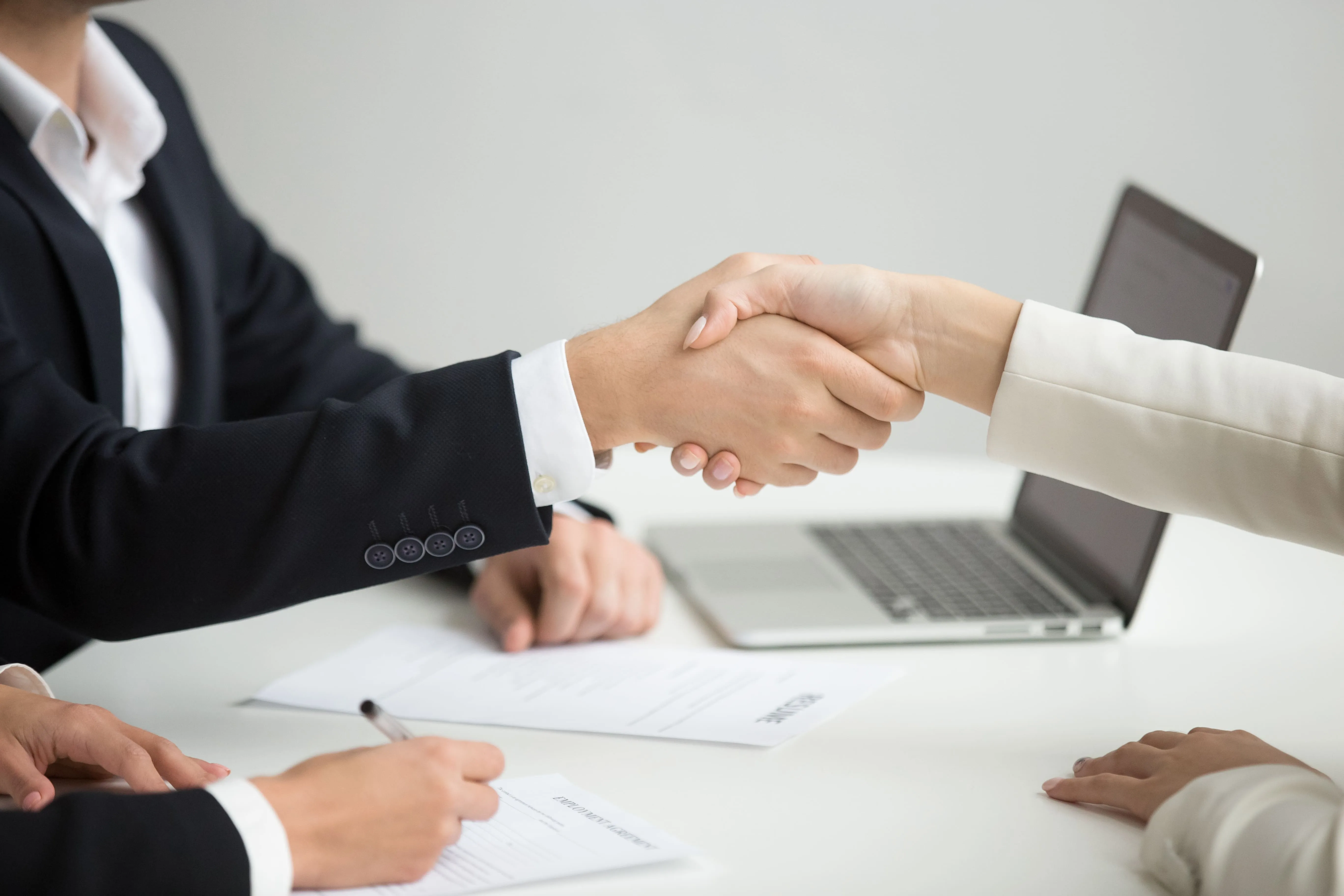 two people shaking hands